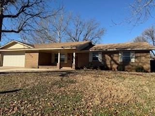 single story home with an attached garage