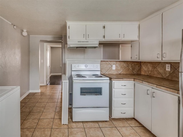 1817 NW 32nd St, Oklahoma City, OK 73118 - kitchen with white cabinetry, under cabinet range hood, and white electric range oven