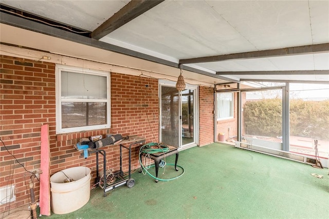 sunroom with beamed ceiling