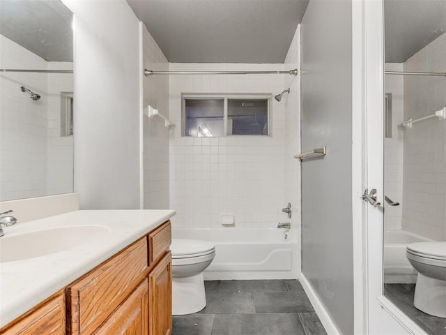 full bath with toilet, washtub / shower combination, baseboards, and vanity