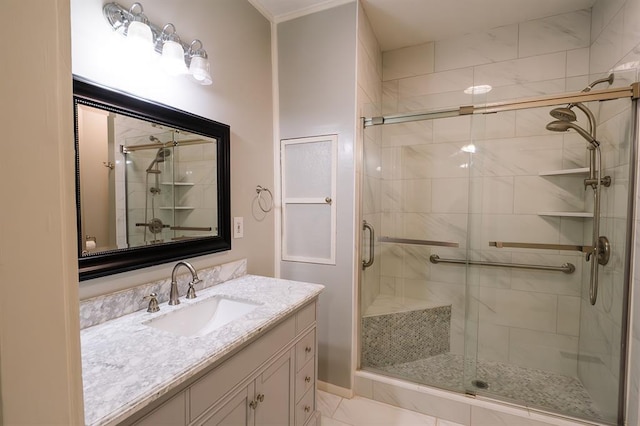 full bath with a stall shower and vanity