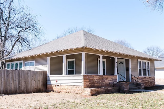 view of front facade with a shingled roof