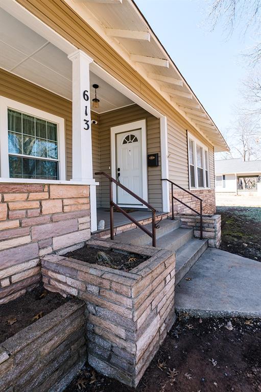 property entrance with a porch