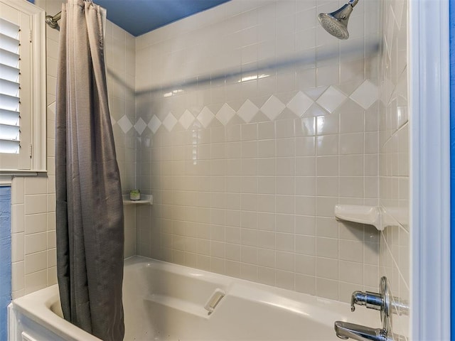 full bathroom with shower / bathtub combination with curtain