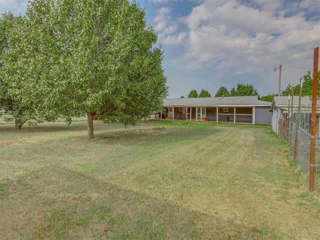 view of yard with fence