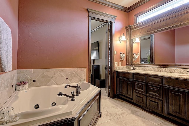 full bath featuring a jetted tub, crown molding, double vanity, tile patterned floors, and a sink