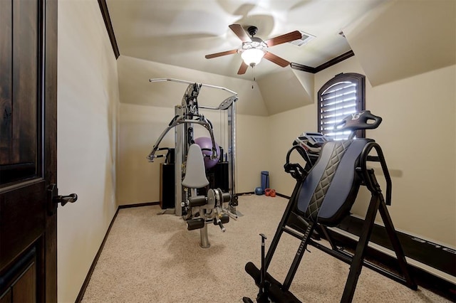 exercise area with visible vents, baseboards, ornamental molding, and a ceiling fan