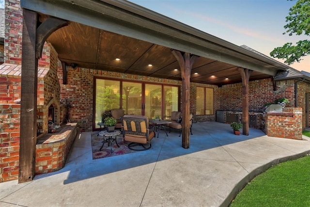 view of patio with an outdoor kitchen