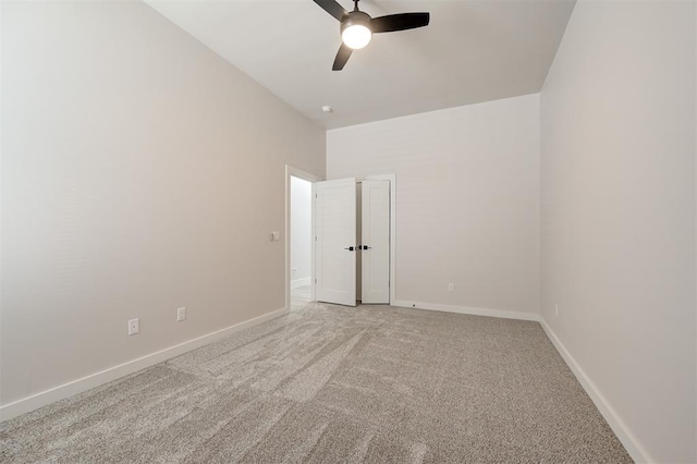 7112 NW 154th St, Edmond, OK 73013 - carpeted spare room featuring a ceiling fan and baseboards