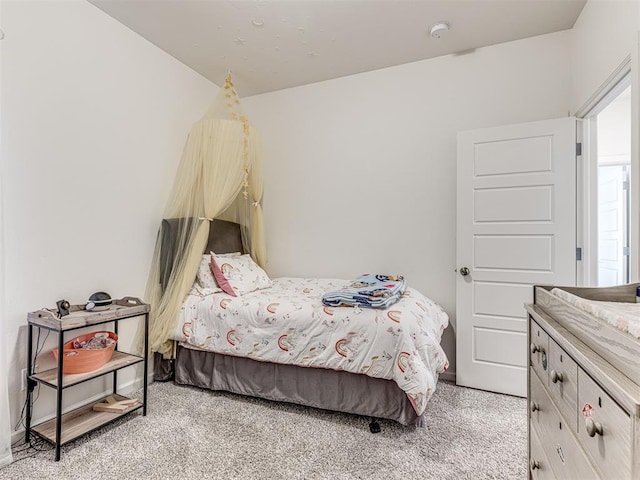 bedroom with light carpet