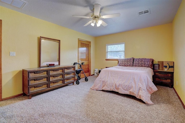 bedroom featuring carpet, visible vents, ceiling fan, and baseboards