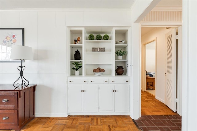 interior details with built in shelves and ornamental molding