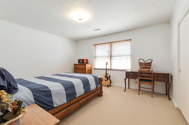 bedroom with light carpet, crown molding, visible vents, and baseboards