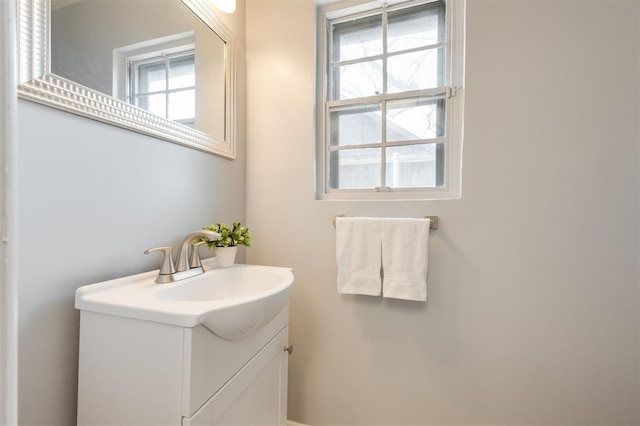 bathroom featuring vanity and a wealth of natural light