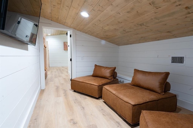 living area with lofted ceiling, recessed lighting, visible vents, wood ceiling, and light wood-type flooring