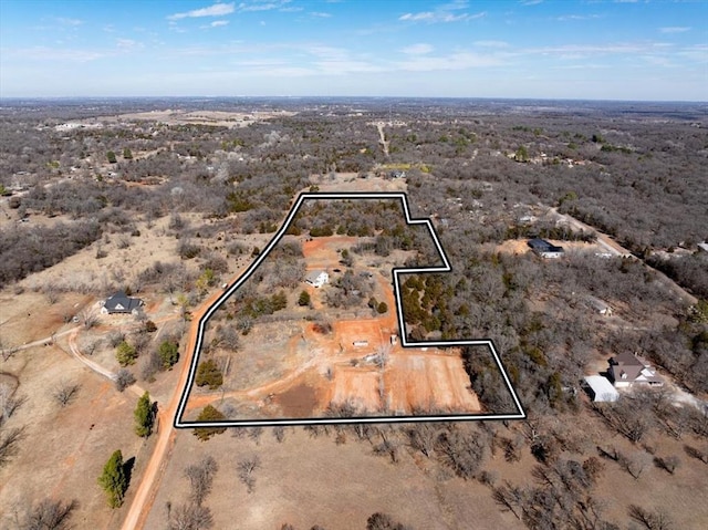 birds eye view of property with a desert view