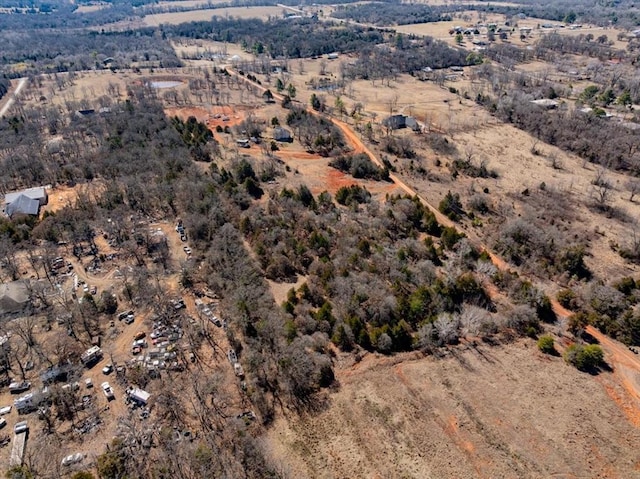 birds eye view of property featuring a rural view