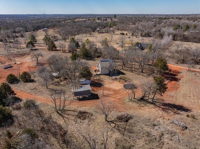 birds eye view of property featuring a rural view