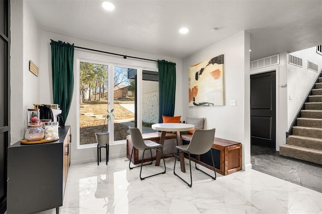 dining space with marble finish floor, stairs, visible vents, and recessed lighting