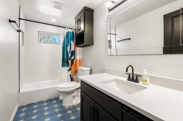 bathroom featuring visible vents, toilet, tile patterned floors, shower / bath combo with shower curtain, and vanity