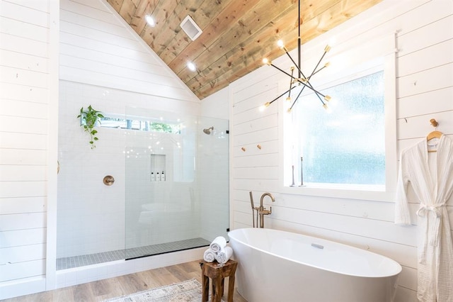 bathroom with lofted ceiling, wooden ceiling, a soaking tub, and a walk in shower