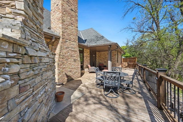 deck featuring outdoor dining area