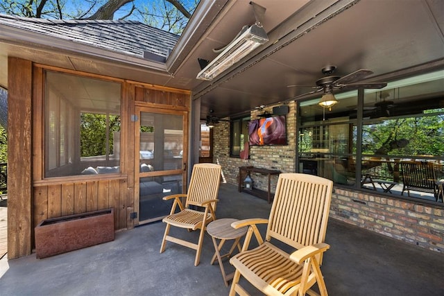 view of patio featuring ceiling fan