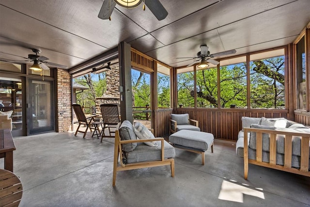 sunroom / solarium with ceiling fan