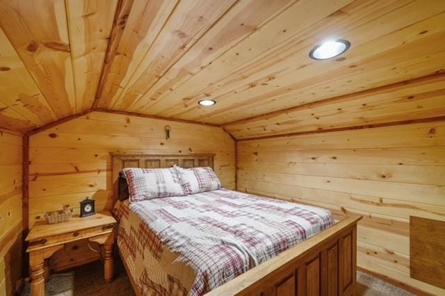 bedroom with wood walls, wood ceiling, vaulted ceiling, and recessed lighting