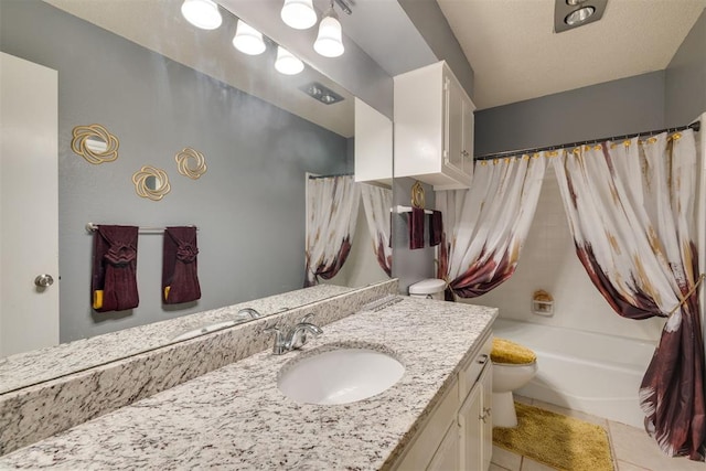 bathroom featuring toilet, tile patterned floors, vanity, and shower / bath combo