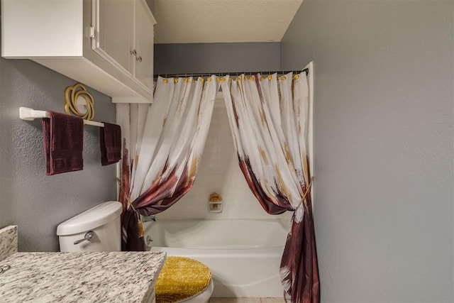 bathroom with toilet, vanity, a textured wall, a textured ceiling, and shower / tub combo