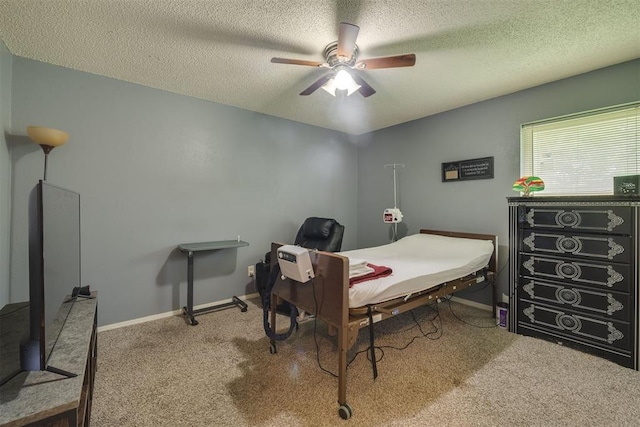 carpeted bedroom featuring ceiling fan, a textured ceiling, and baseboards