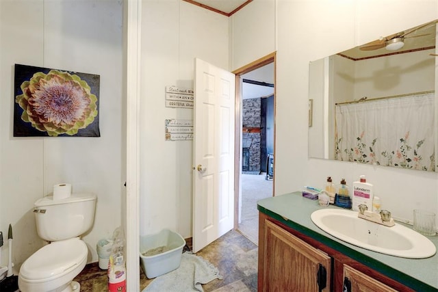 bathroom featuring vanity and toilet