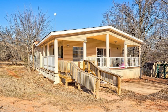 manufactured / mobile home with a porch