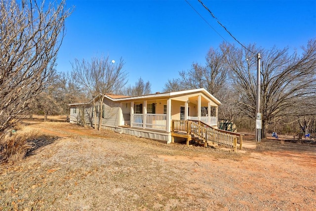 view of front of house with covered porch