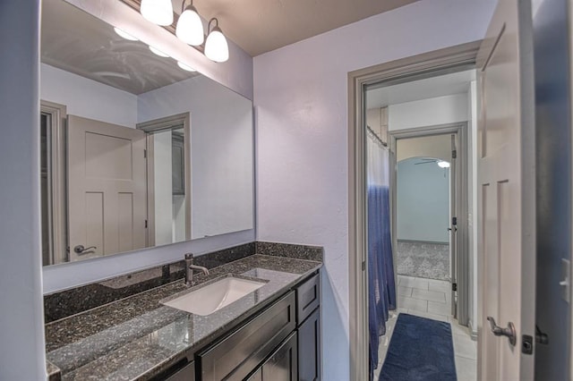 bathroom with vanity and tile patterned floors