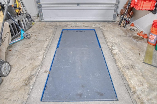 view of storm shelter with a garage