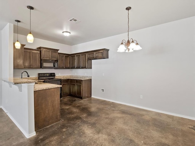 kitchen with visible vents, light stone counters, a peninsula, black appliances, and concrete floors