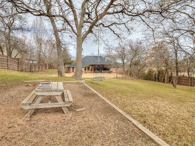 view of yard featuring fence