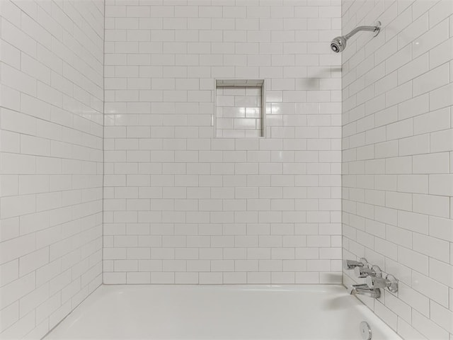 full bathroom with washtub / shower combination