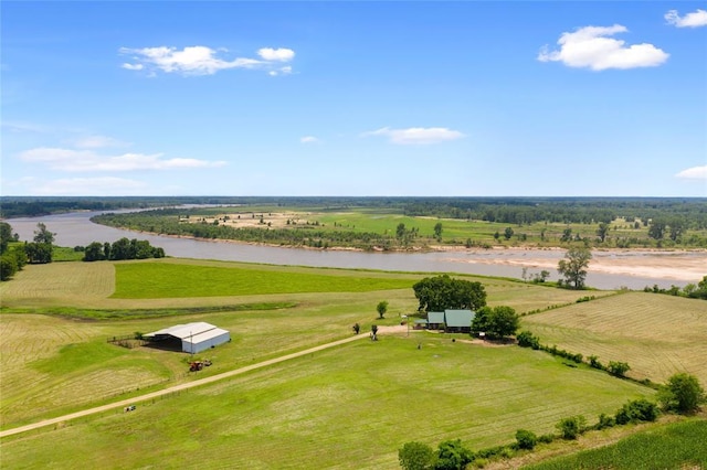 drone / aerial view with a water view and a rural view