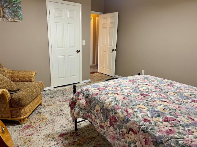 bedroom featuring baseboards