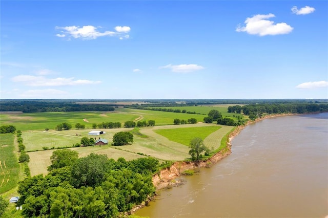 drone / aerial view with a water view and a rural view