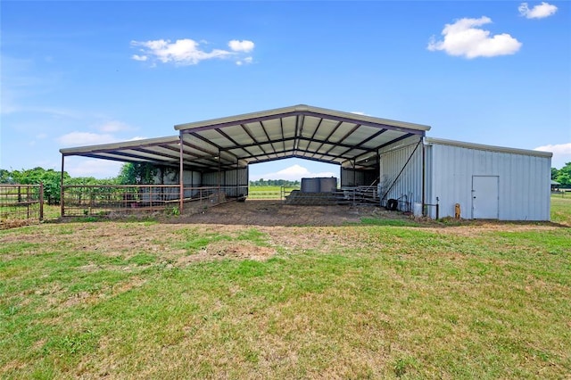 view of vehicle parking featuring driveway and a detached carport