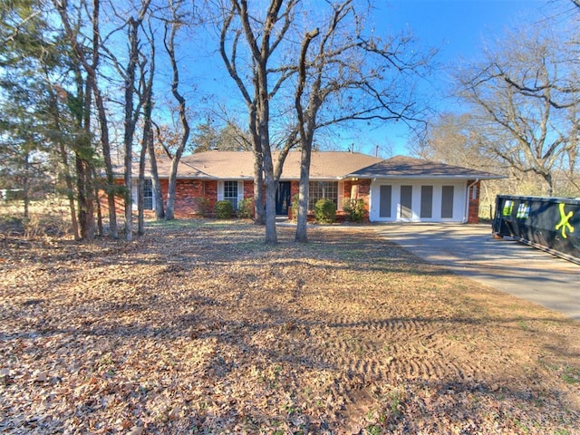 ranch-style house with brick siding