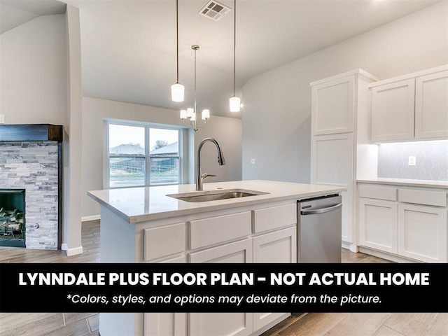 8516 NW 75th St, Oklahoma City, OK 73132 - kitchen with a kitchen island with sink, a sink, visible vents, backsplash, and dishwasher