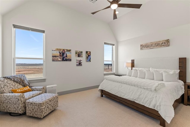 carpeted bedroom featuring visible vents, vaulted ceiling, baseboards, and ceiling fan