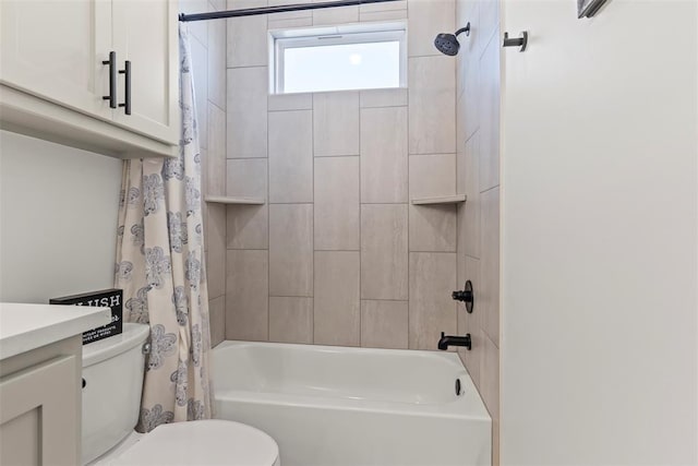 full bathroom featuring shower / tub combo with curtain, vanity, and toilet