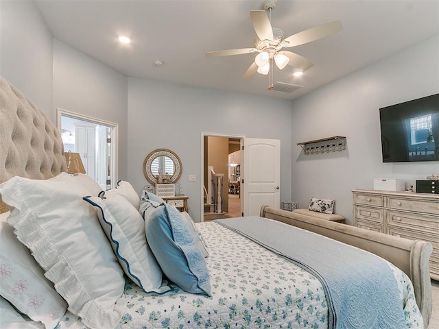 bedroom with visible vents and a ceiling fan