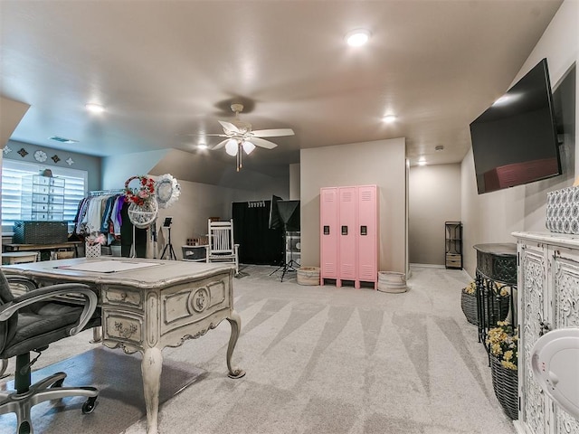 home office with light carpet, ceiling fan, and visible vents